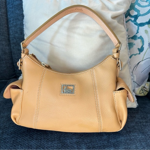 Dooney and Bourke Bag . Medium sized. Has imperfections . - Picture 17 of 17